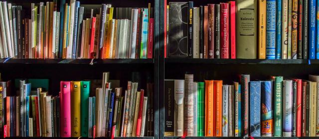 A bookcase full of novels and children's books 