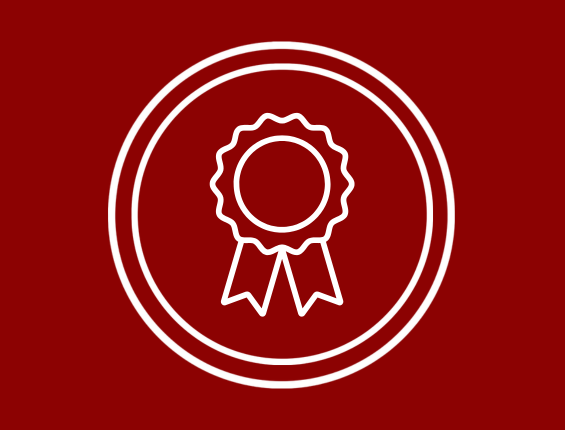 Ruban de récompense blanc au centre d'un cercle sur un fond rouge foncé.